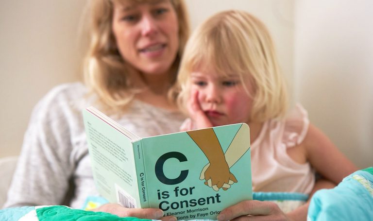Jessica Rolph, Co-founder and CEO of Lovevery, and her daughter reading the book C is for Consent together